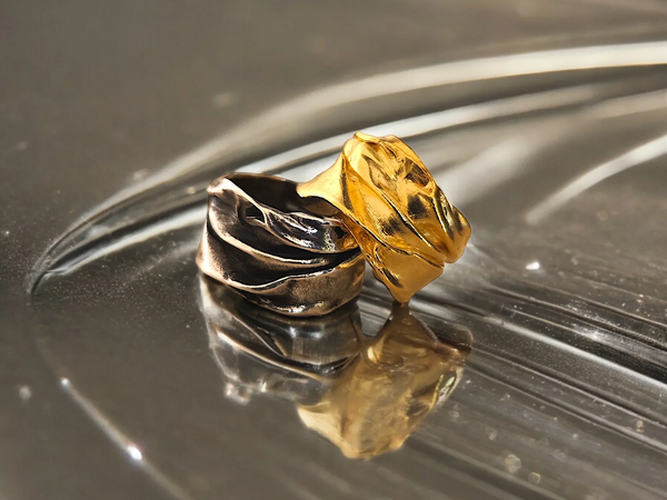 Original Athenart Peplos rings—oxidized silver and gold-plated with draped folds