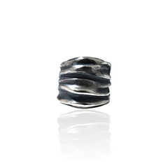 Athenais wide draped ring in oxidized sterling silver on white background