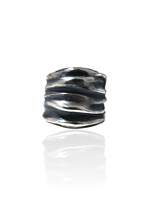 Athenais wide draped ring in oxidized sterling silver on white background