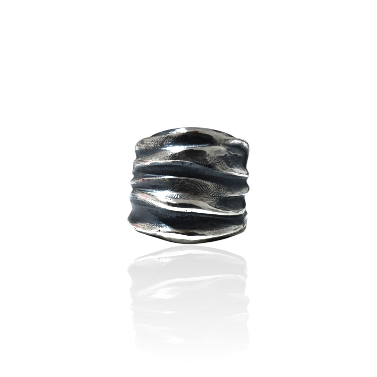 Athenais wide draped ring in oxidized sterling silver on white background