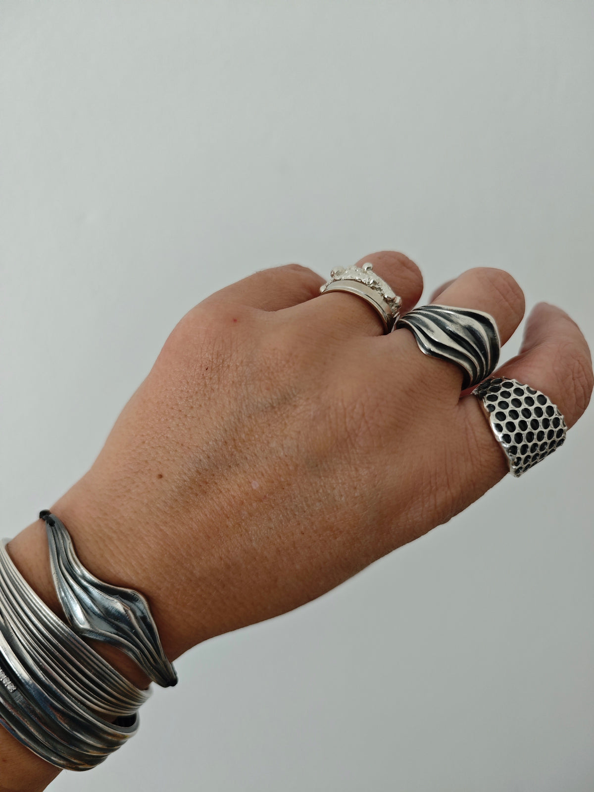 Adjustable silver bracelet inspired by ancient Greek folds