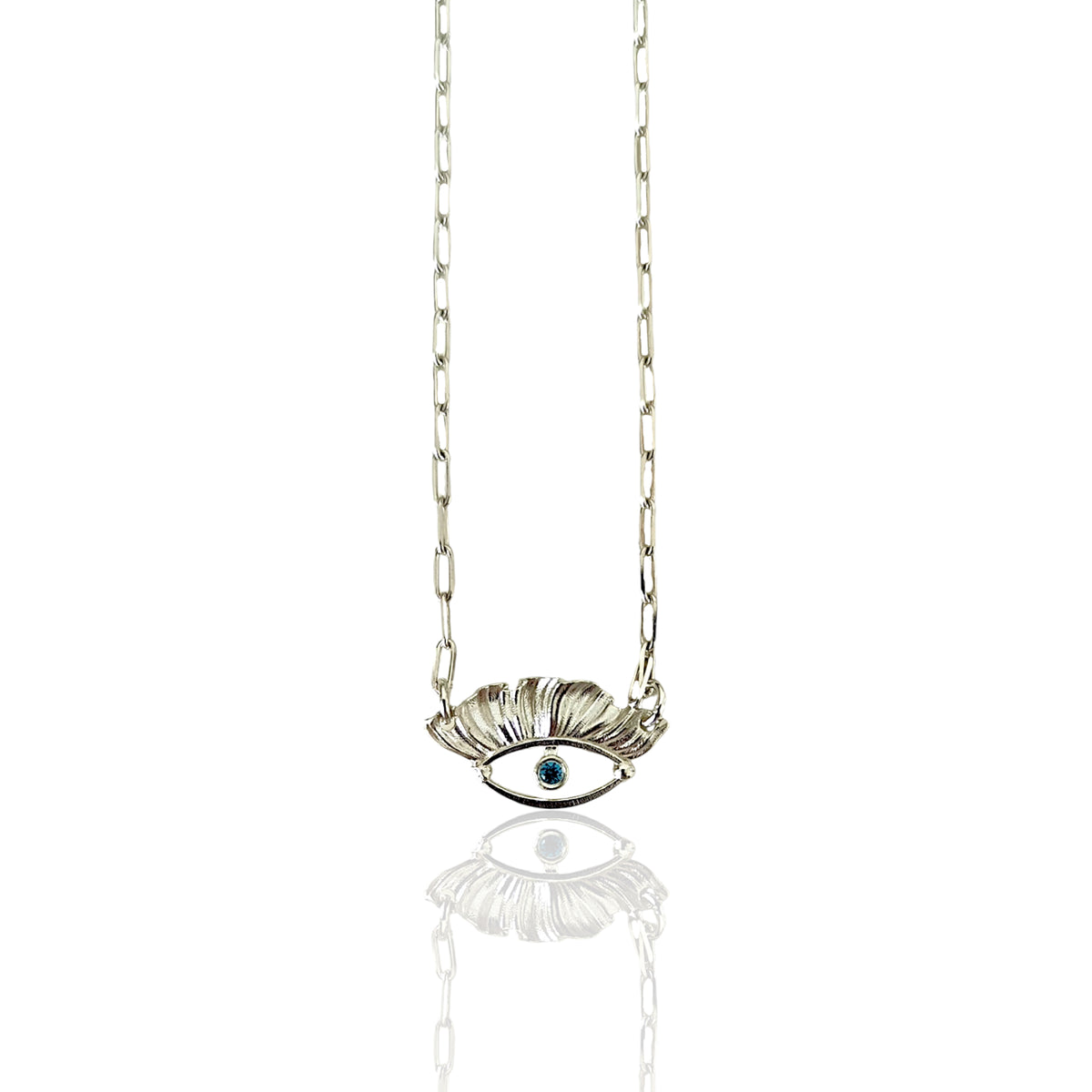 Handmade silver evil eye charm necklace by Athenart with blue stone. Available for wholesale 