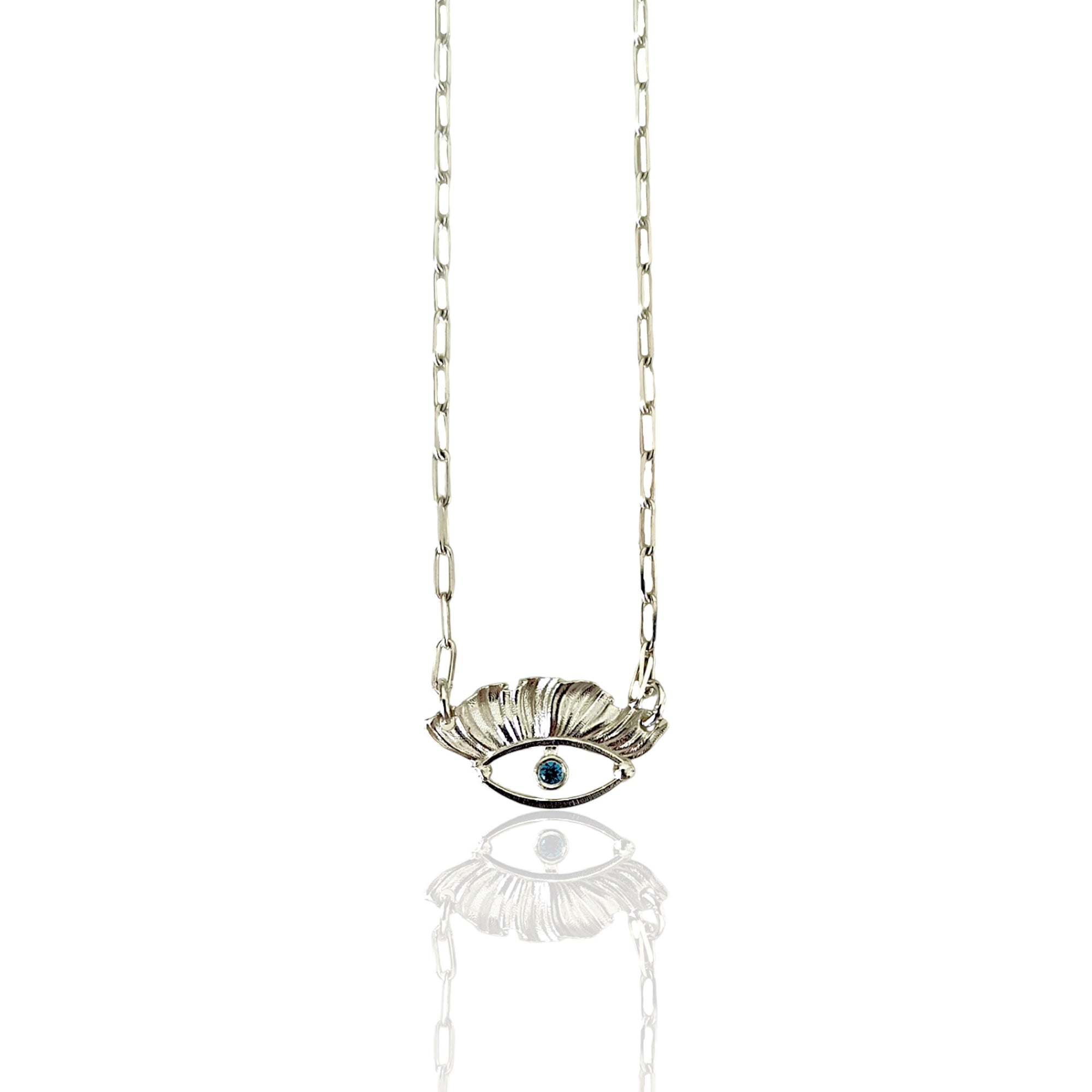 Handmade silver evil eye charm necklace by Athenart with blue stone. Available for wholesale 