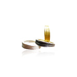 Two gold and silver rings on a white background