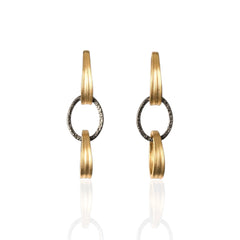 Two-tone geometric drop earrings on white background, Orbit Link Earrings front view