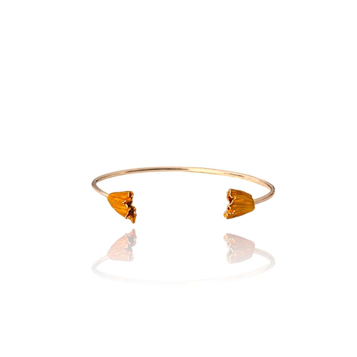 Athenais fold cuff bracelet in gold and silver handmade by Athenart Jewelry