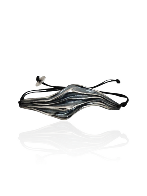 Wave silver bracelet with sculptural flowing design and black cord by Athenart