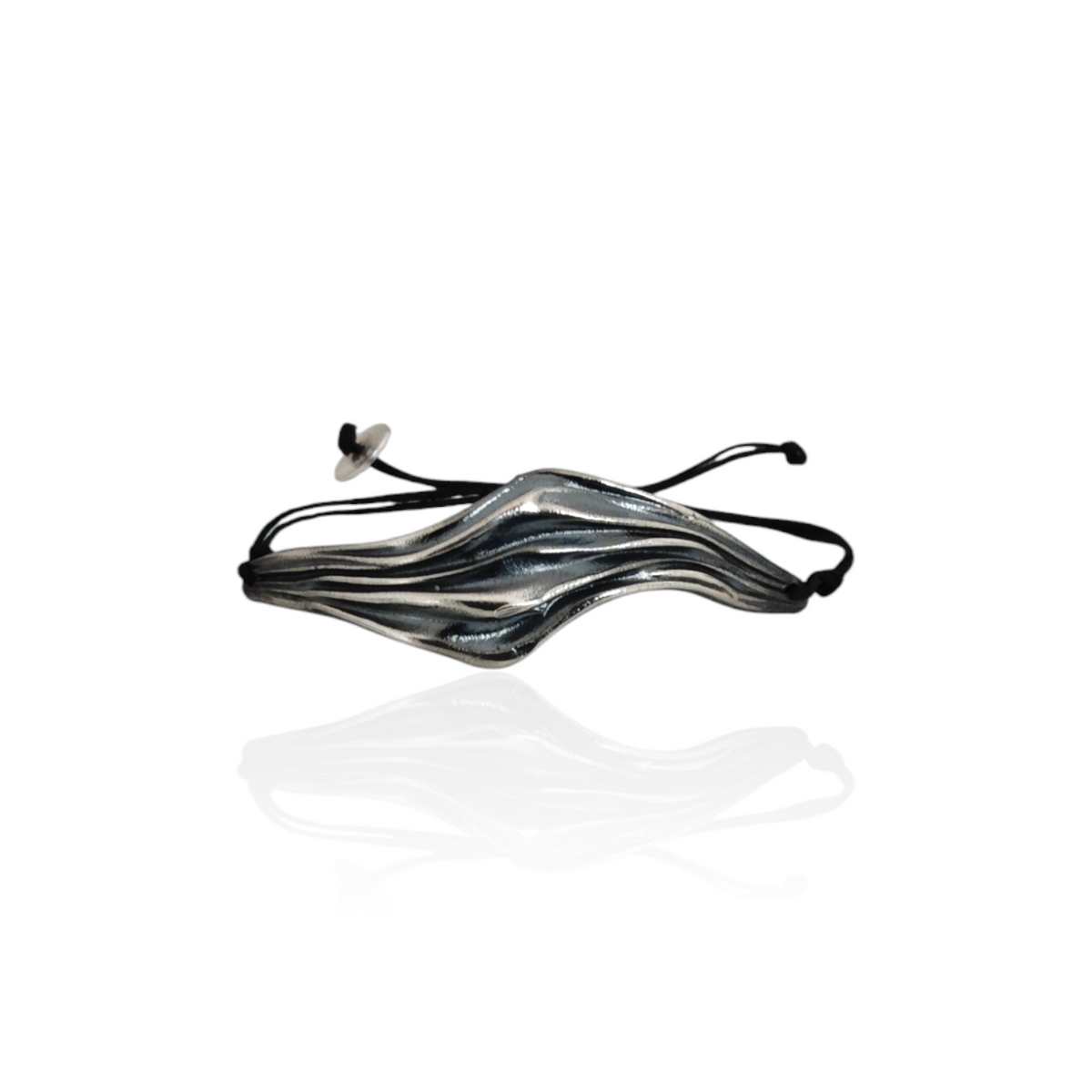 Wave silver bracelet with sculptural flowing design and black cord by Athenart