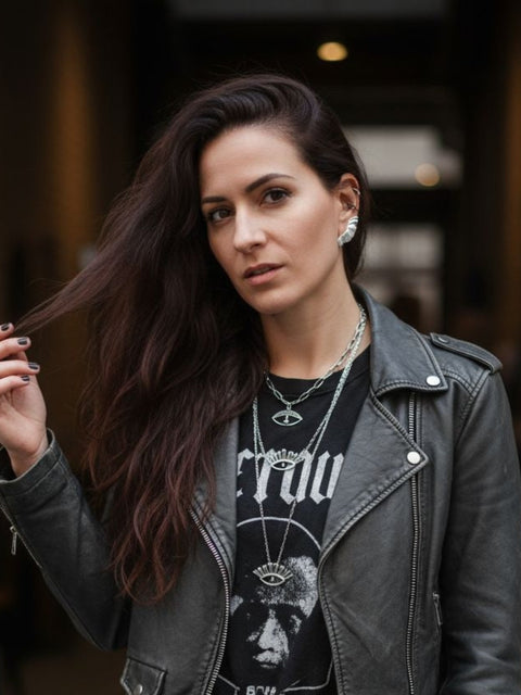 Woman wearing Aether wing ear climber earrings in sterling silver, street style