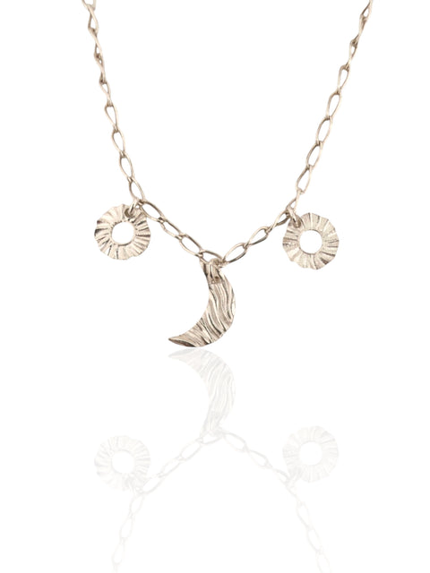 Helios and Selene charm necklace in silver with moon and sun charms