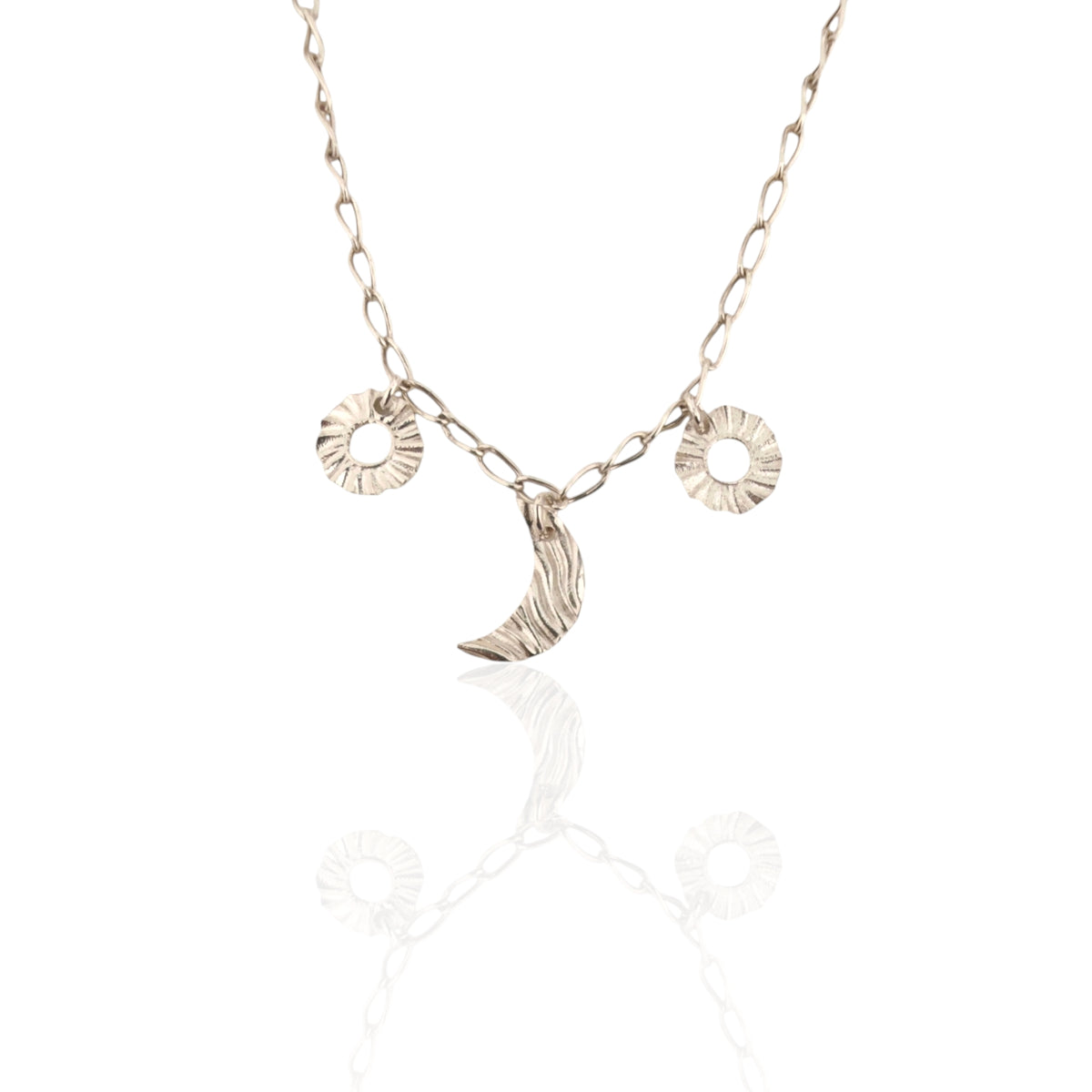 Helios and Selene charm necklace in silver with moon and sun charms