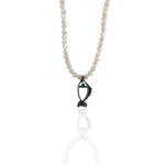 Necklace with a fish-shaped pendant made of silver with blue eye, talisman