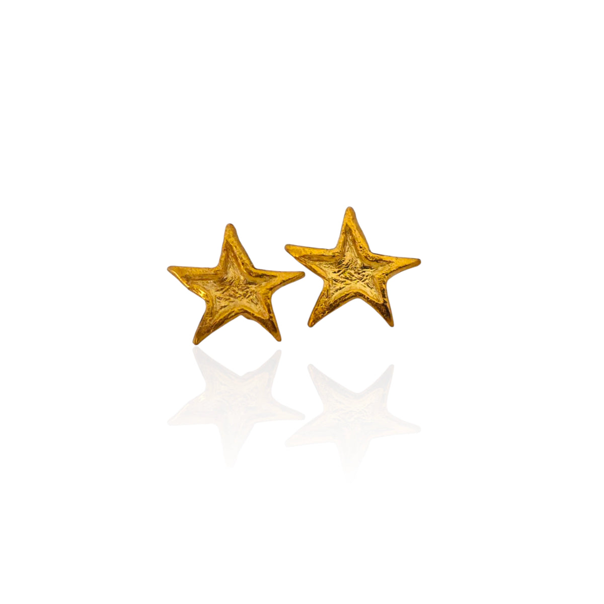 Gold-plated Asteria star earrings on white background