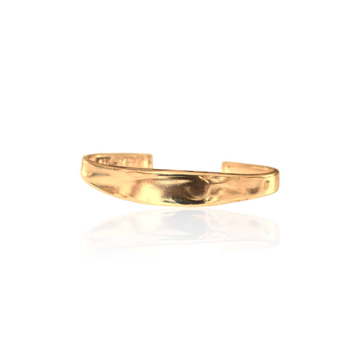 Plain gold-plated sterling silver cuff bracelet with softly wavy surface.