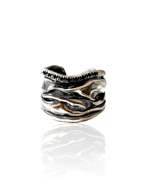 Athenais Notos Ring – handmade silver wide band ring with flowing folds and zircons, inspired by the southern wind.