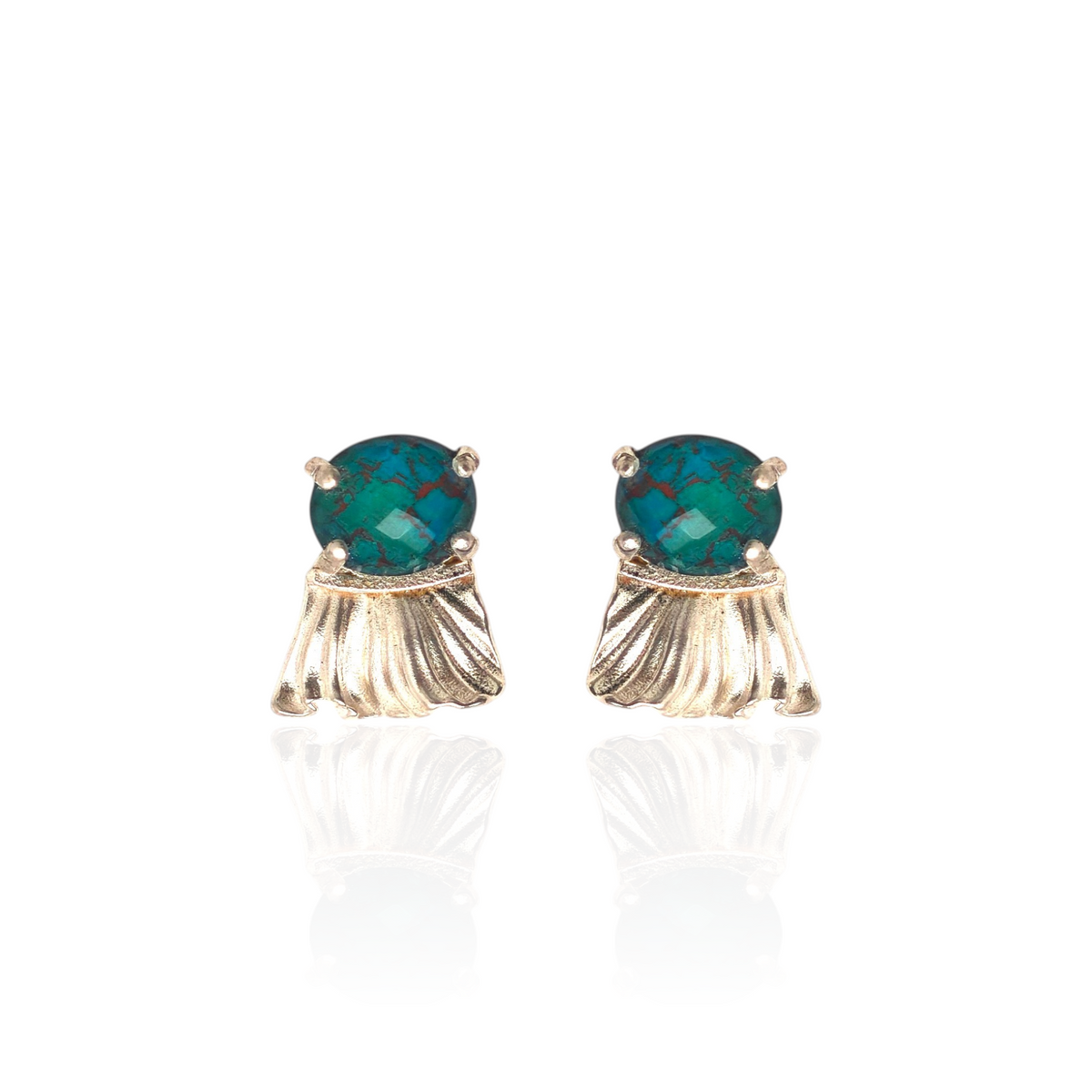 Pair of earrings with green gemstones and gold fringe on a white background