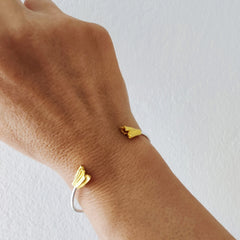 Athenais fold cuff bracelet in gold and silver handmade by Athenart Jewelry