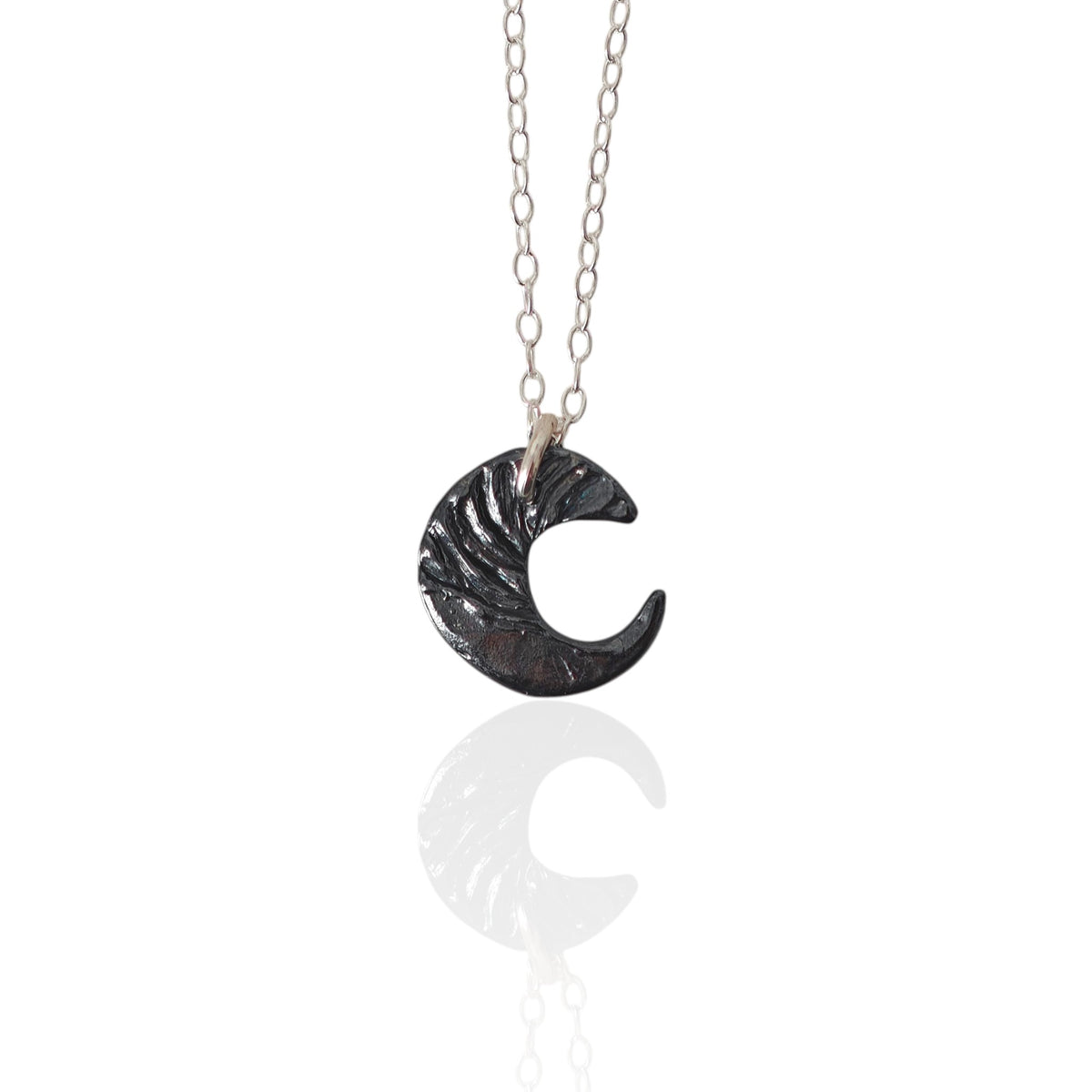Moon Whisper black oxidized silver crescent moon necklace