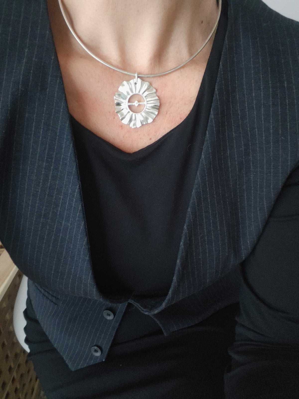 Helios silver choker necklace worn with black outfit