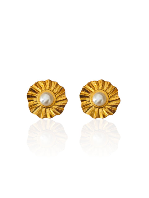Helios sunburst stud earrings with white pearl center on white background