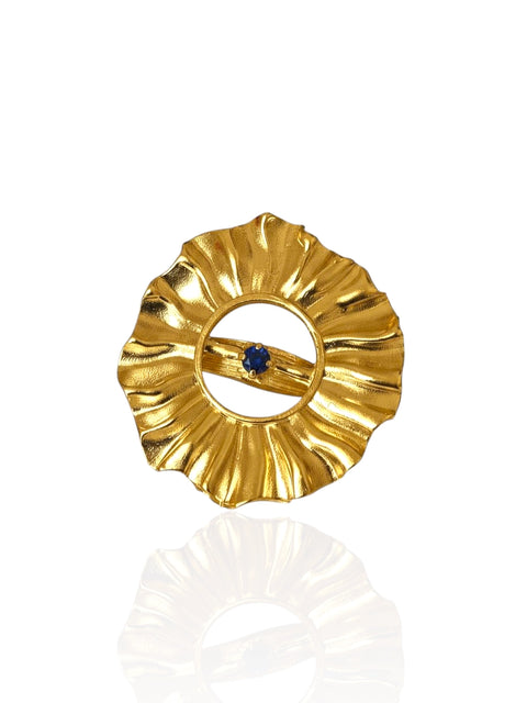Helios big ring in gold-plated silver with central blue zircon, ripple sun design, product on white