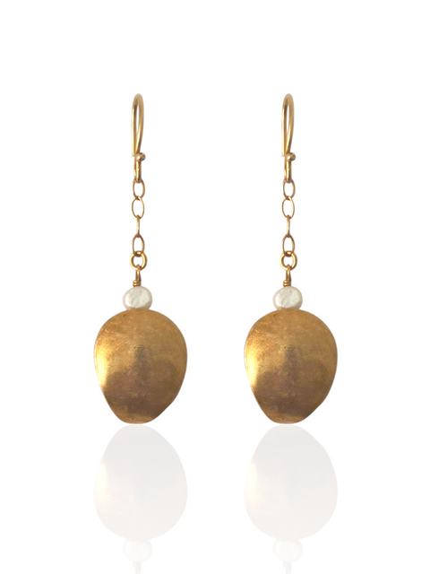 Luxury handcrafted shell earrings inspired by hidden treasures of the sea.