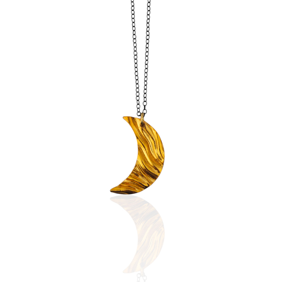 Small Selene crescent moon necklace in gold-plated sterling silver on gold chain, Athenart jewelry, white background.