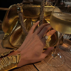 Gold Fustanela cuff bracelet styled with Athenart jewelry