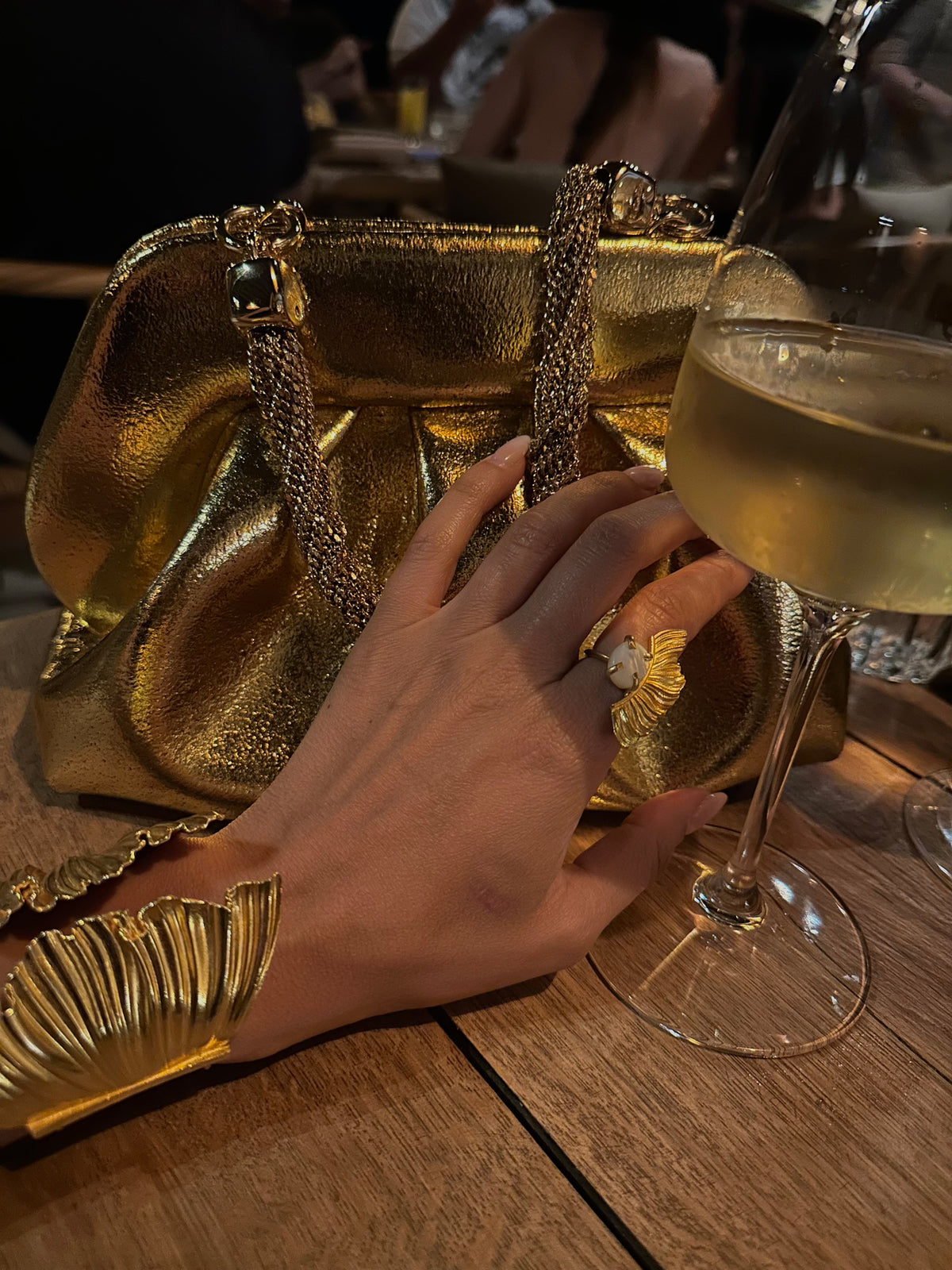 Gold Fustanela cuff bracelet styled with Athenart jewelry
