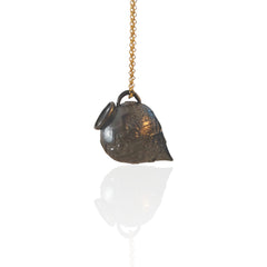 Ancient Whisper oxidized silver Amphora necklace with gold-plated chain on a white background