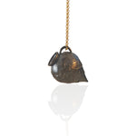 Ancient Whisper oxidized silver Amphora necklace with gold-plated chain on a white background