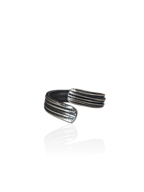 Silver ring with textured design on a white background unisex , handmade in Athens 