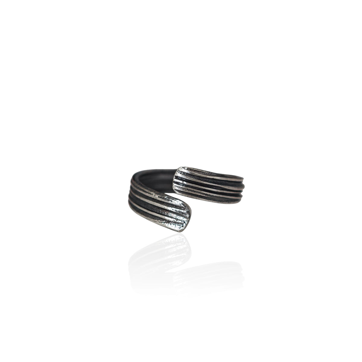 Silver ring with textured design on a white background unisex , handmade in Athens 