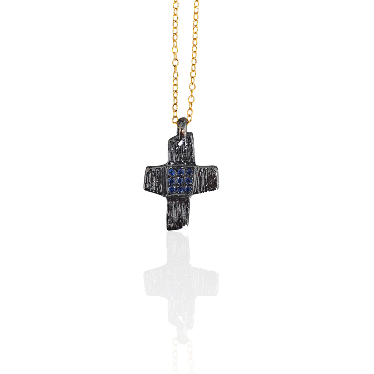 Handmade organic silver oxidized cross with blue xircons 