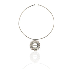 Helios silver choker necklace with sculptural sun charm