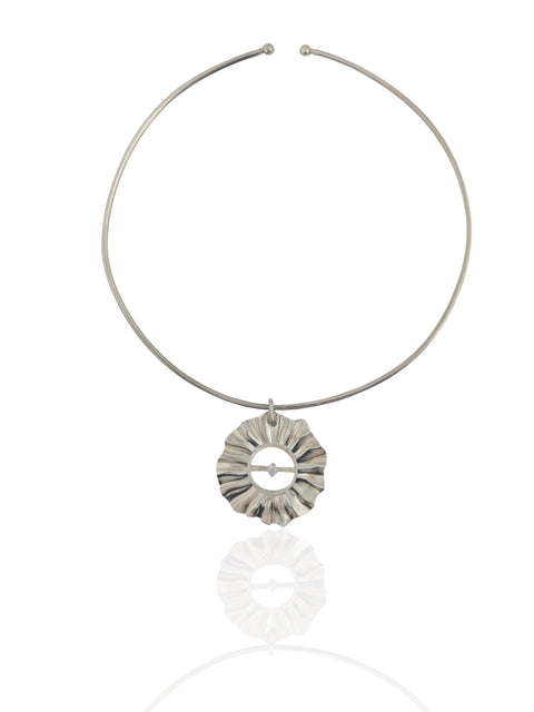 Helios silver choker necklace with sculptural sun charm