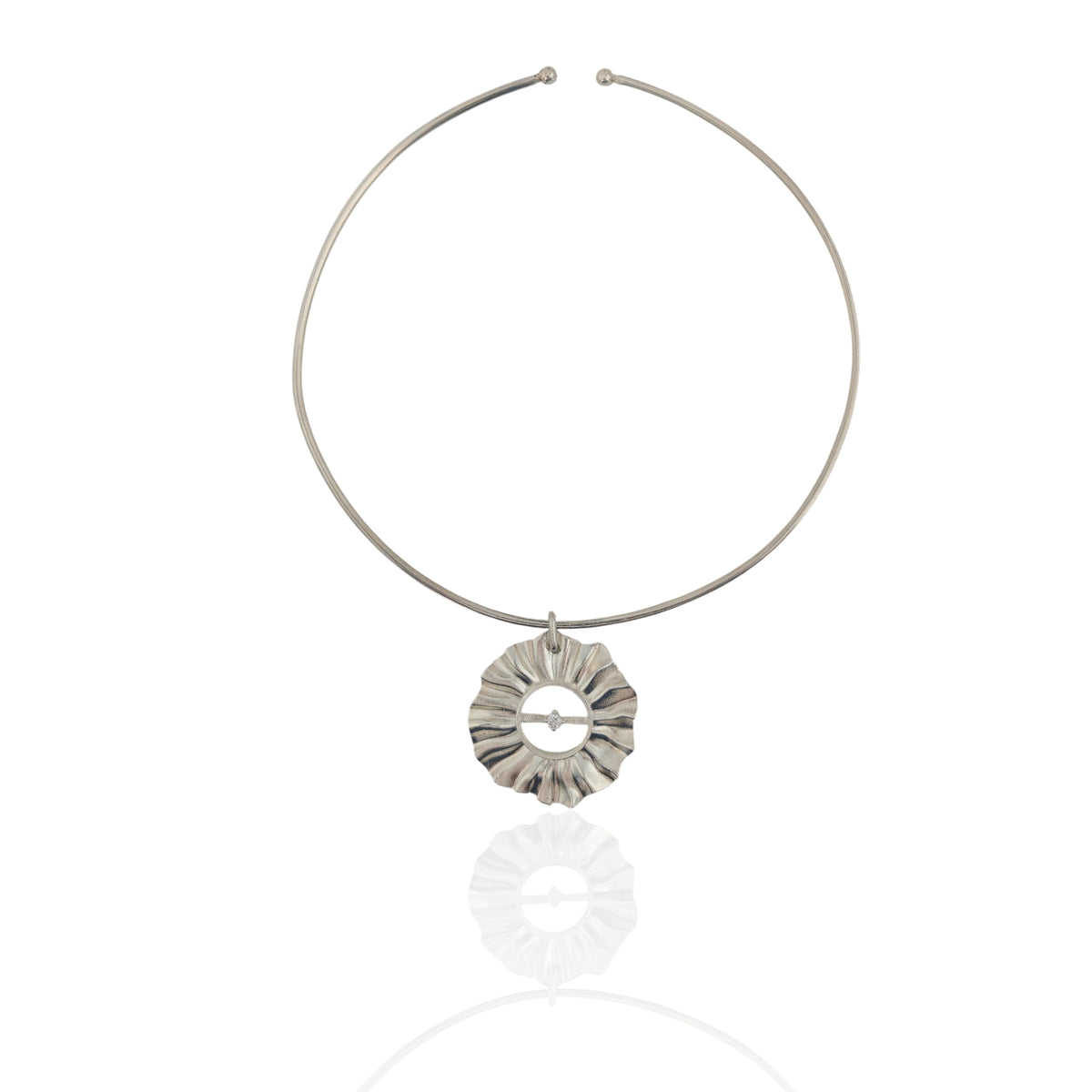 Helios silver choker necklace with sculptural sun charm