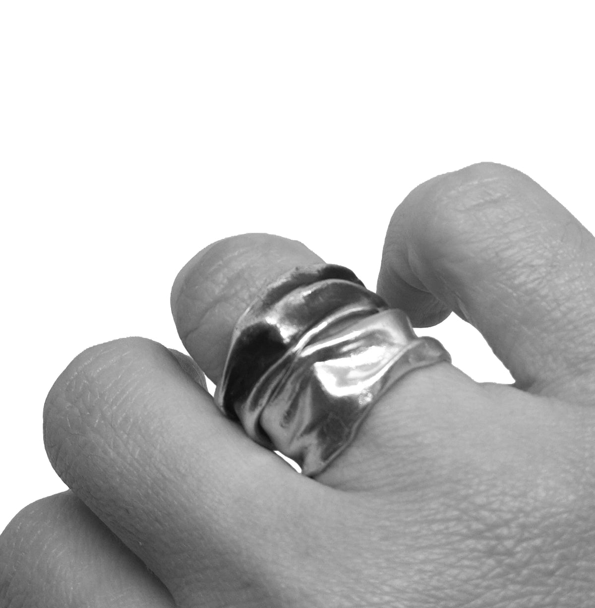 Mini Athenais ring trio, silver, oxidized silver, and gold-plated draped bands on white background