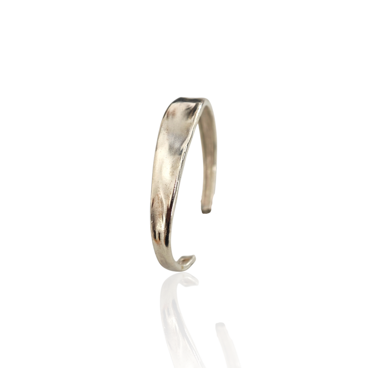 Plain sterling silver 925 cuff bracelet with softly wavy surface, side view