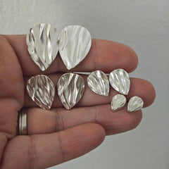 Silver drop stud earrings with wavy tecture by the Greek designer Athena Papa , ATHENART  handmade in Athens 