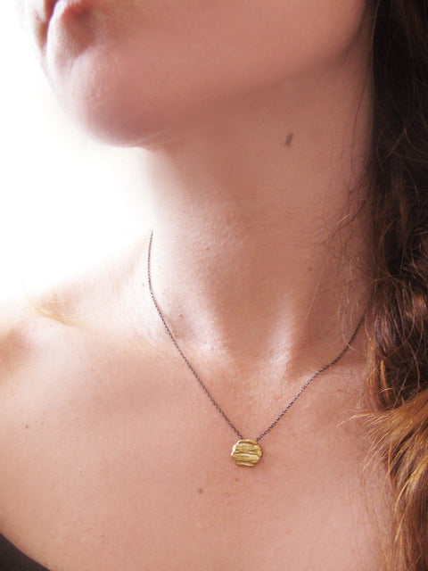 Nugget charm necklace worn on model handmade in Athens