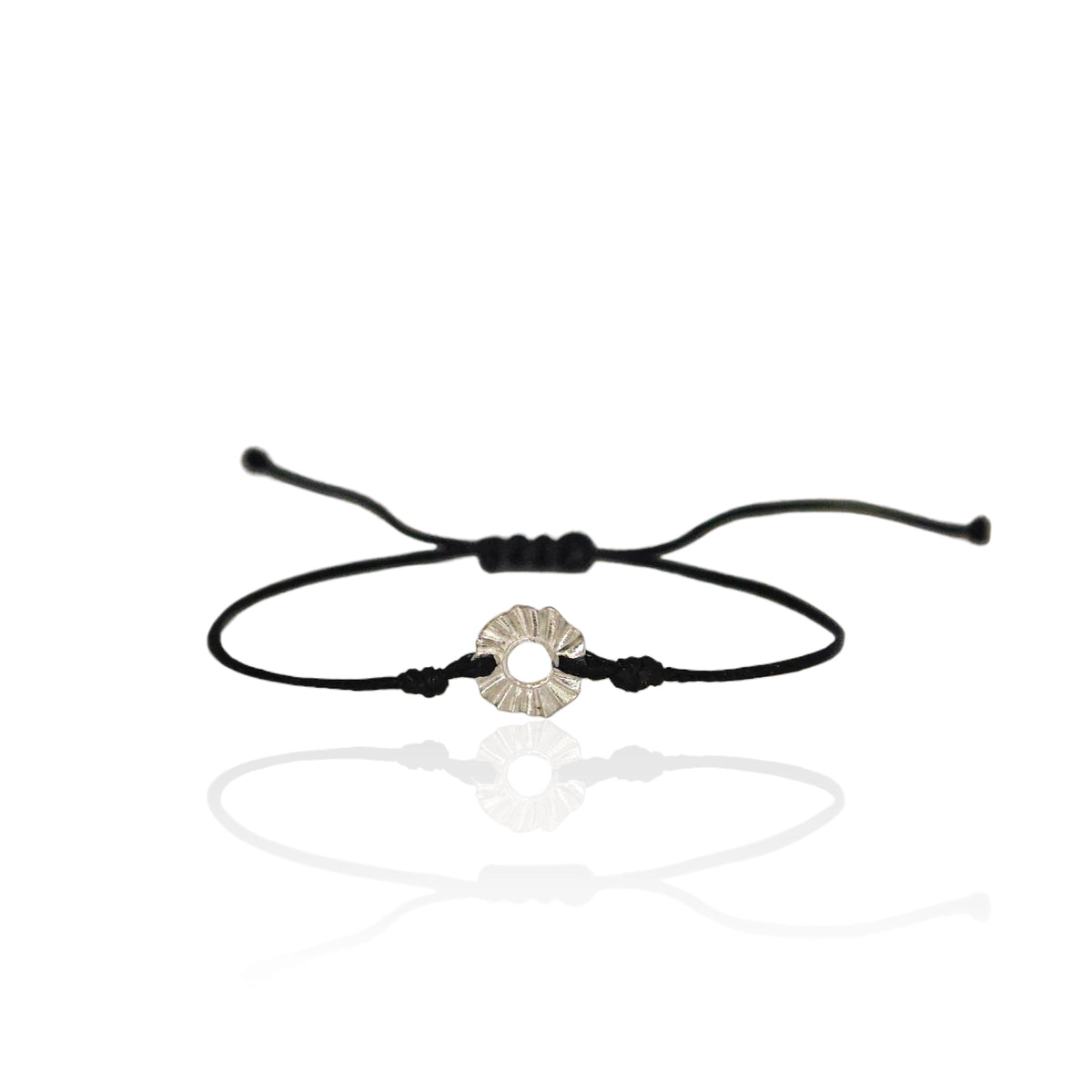 Black cord bracelet with a silver circular charm . A talisman, sun, helios by Athenart, Greek jewelry designers 