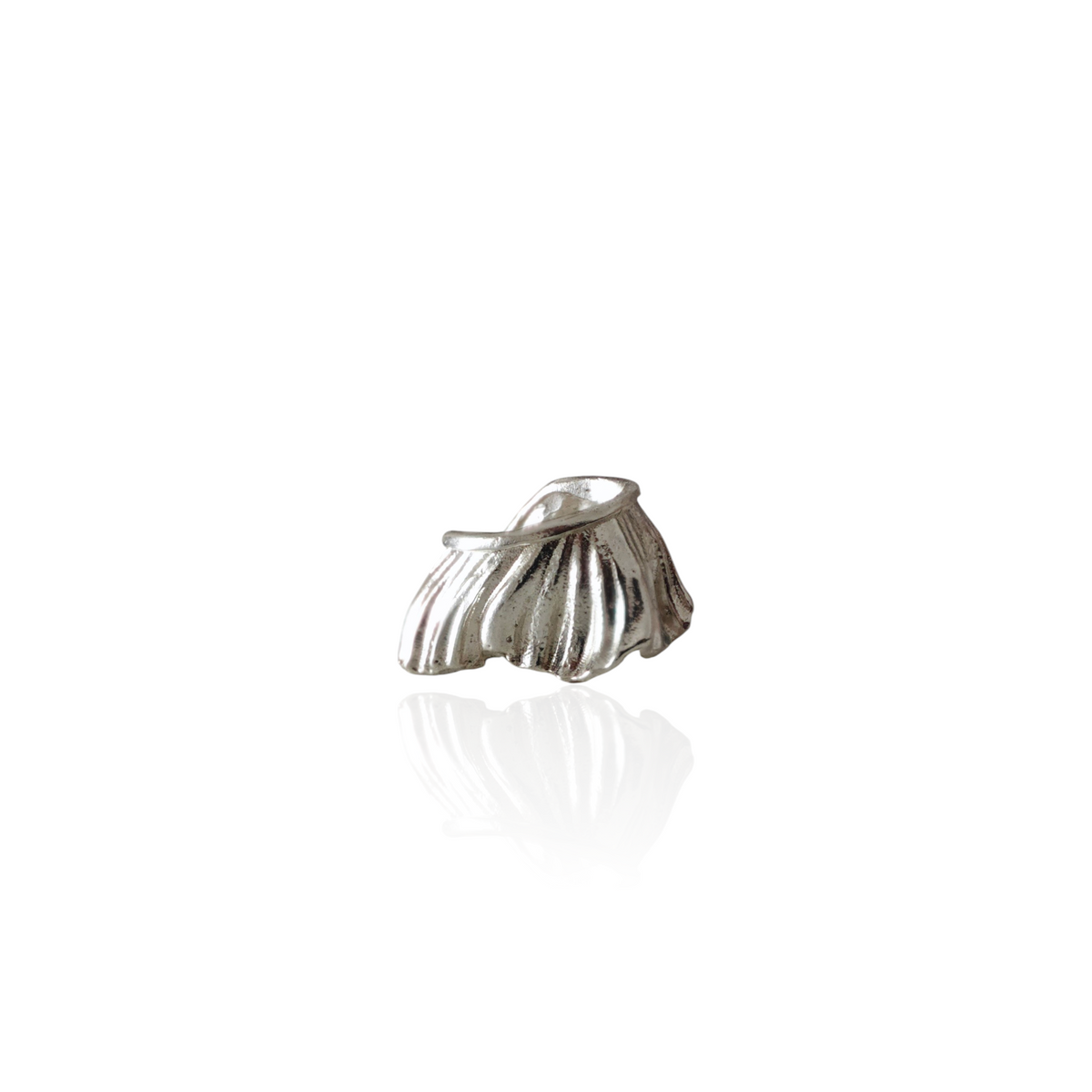Peplos Shell silver ear cuff by Athenart on white background