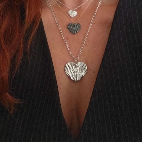 Silver Heart, kardia, necklaces with chains worn. Retails, wholesale jewelry by Athenart made in Greece.