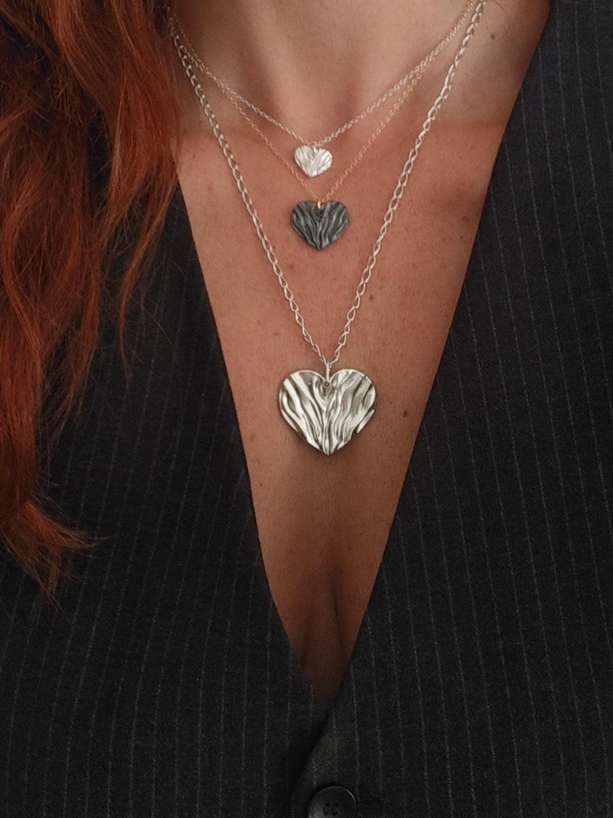 Silver Heart, kardia, necklaces with chains worn. Retails, wholesale jewelry by Athenart made in Greece.