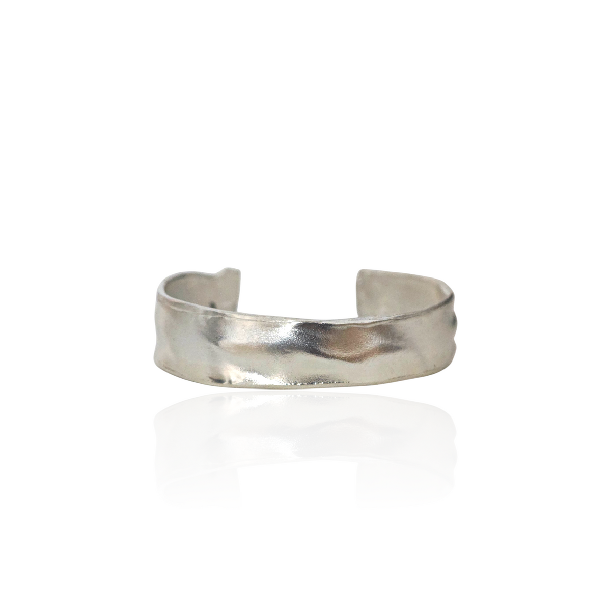 Silver cuff bracelet on a white background