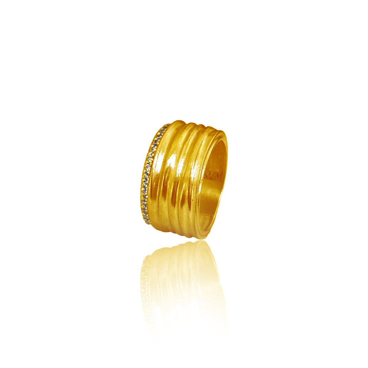 Gold ring with textured design and small stones on a white background