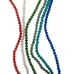 Set of colorful beaded necklaces on a white background