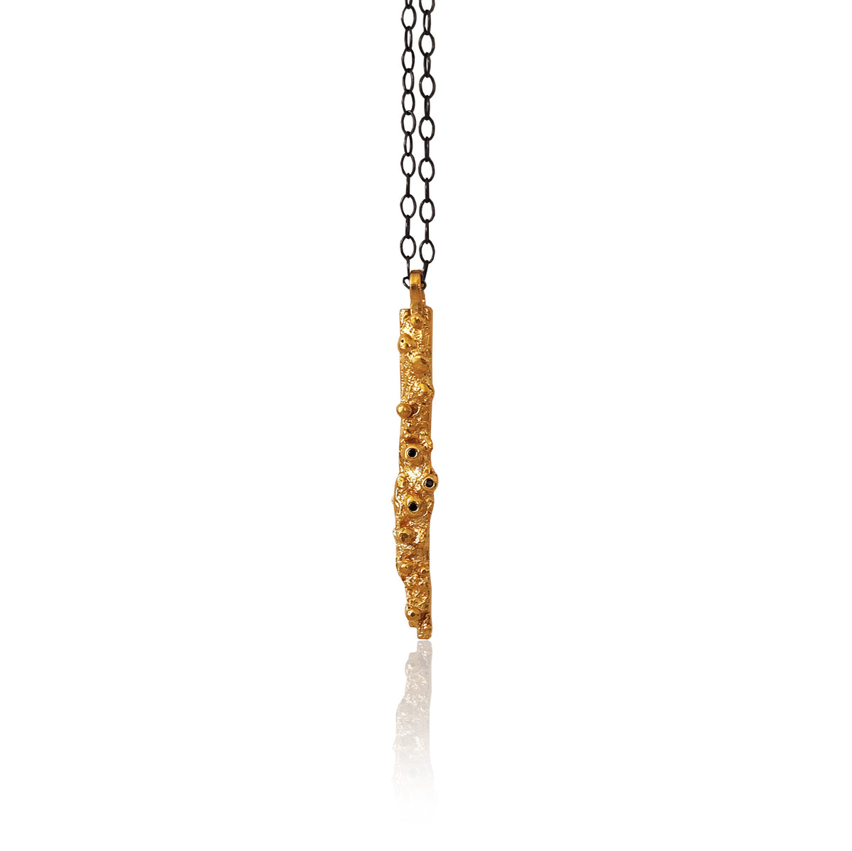 Organic stick pendant necklace in gold plated silver with zircons