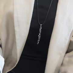 Long handmade pendant necklace with black, red, or white zircons